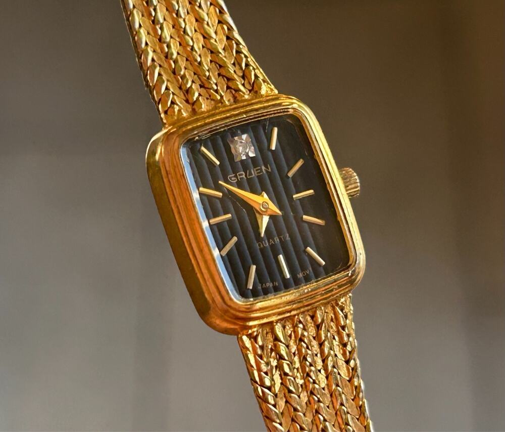 Vintage Gruen Ladies Quartz Watch Diamond Accent Black Dial Gold Woven Bracelet